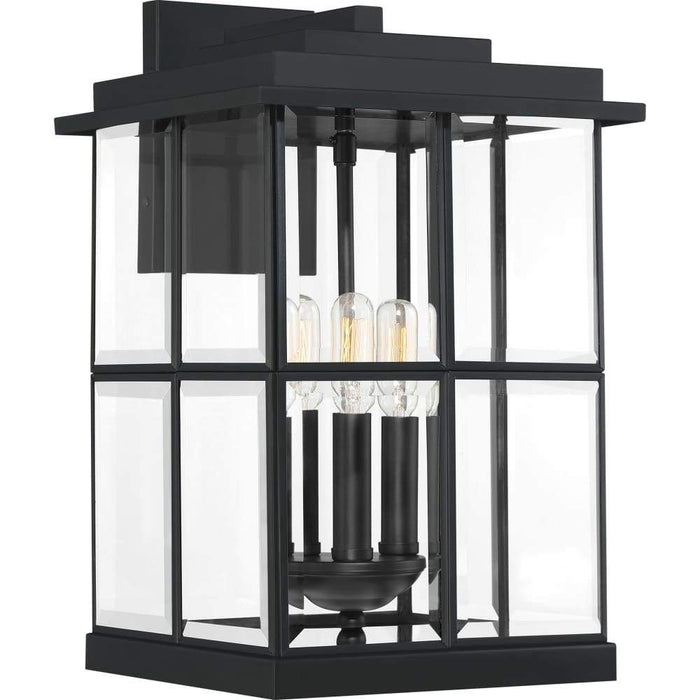 Matte black wall sconce, by Quoizel, for hallway or living room