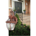 Aged copper wall sconce, by Quoizel, for hallway or living room