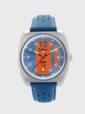 Montre Kelton cadran orange sur fond bleu, boîtier argenté et bracelet cuir bleu perforé.