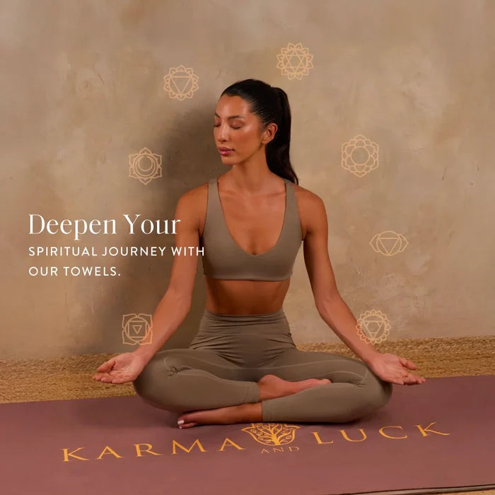 Woman in yoga pose on a 'Karma and Luck' mat with text promoting towels.